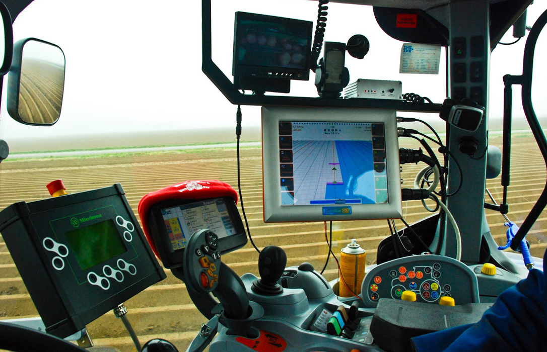 Farm tractor with GPS equipment